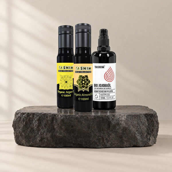 Pflegeöl Trio: Bio-Arganöl, Bio-Mandelöl und Bio-Jojobaöl je 100 ml auf Basaltstein