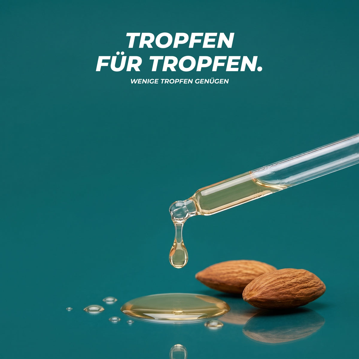 Textur: ein Tropfen Bittermandelöl fällt aus der Glaspipette in eine kleine Ölpfütze neben zwei Mandeln