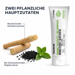 Rohstoff-Stillleben auf Weiß: Miswak-Zweig (Salvadora persica), schwarze Schwarzkümmelsamen (Nigella sativa) und Minzblätter neben der Tasnim Bio-Zahnpasta-Tube 75 ml.