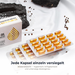Vier Blisterstreifen mit Schwarzkümmelöl-Kapseln neben der Verpackung: jede Kapsel einzeln versiegelt, hygienisch und lichtgeschützt