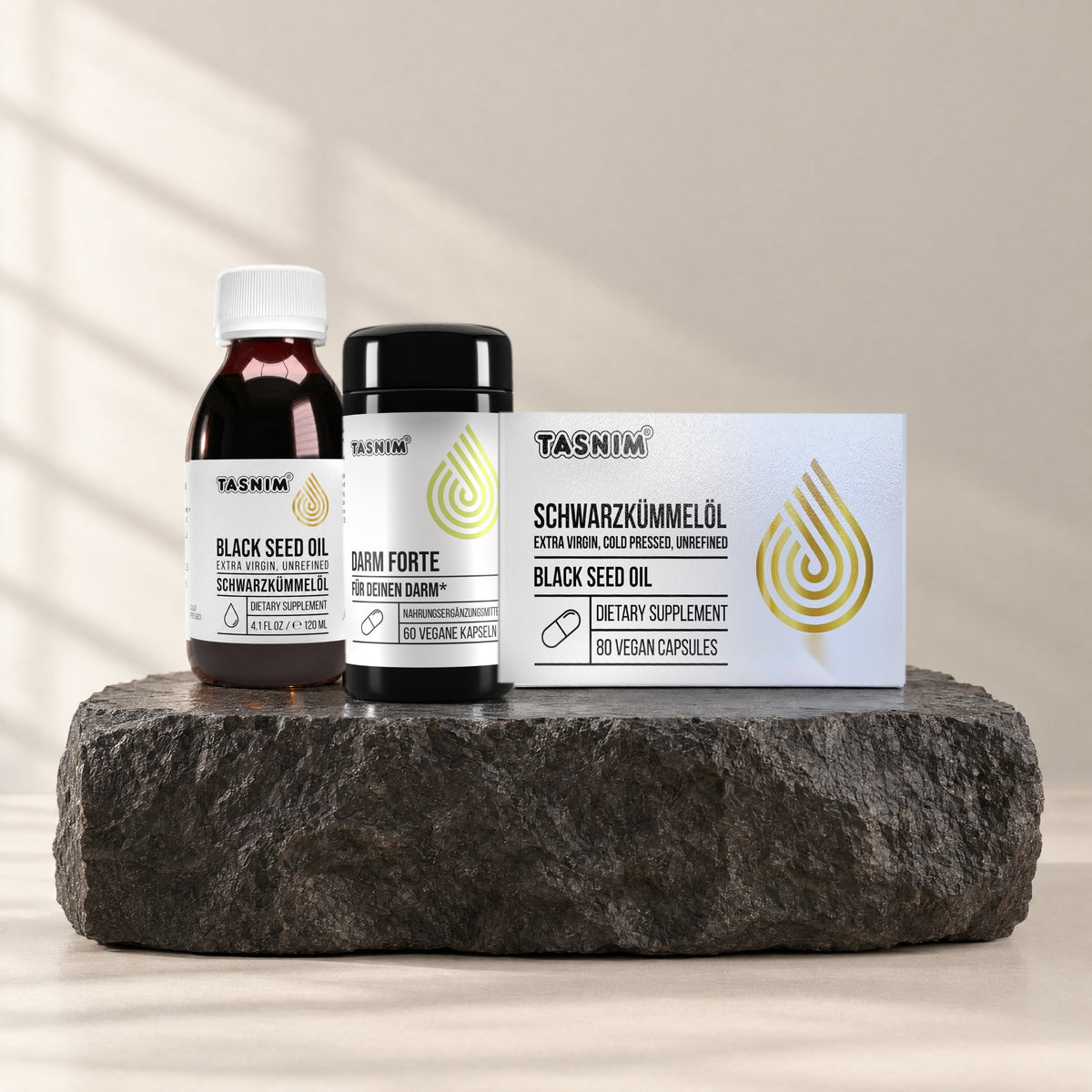 Darm Routine Set: äthiopisches Schwarzkümmelöl 120 ml, Darm Forte und Schwarzkümmelöl-Kapseln auf Basaltstein