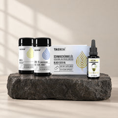 Men's Daily Set: Maca, Zink 15, Schwarzkümmelöl-Kapseln und Bio-Bartöl auf Basaltstein