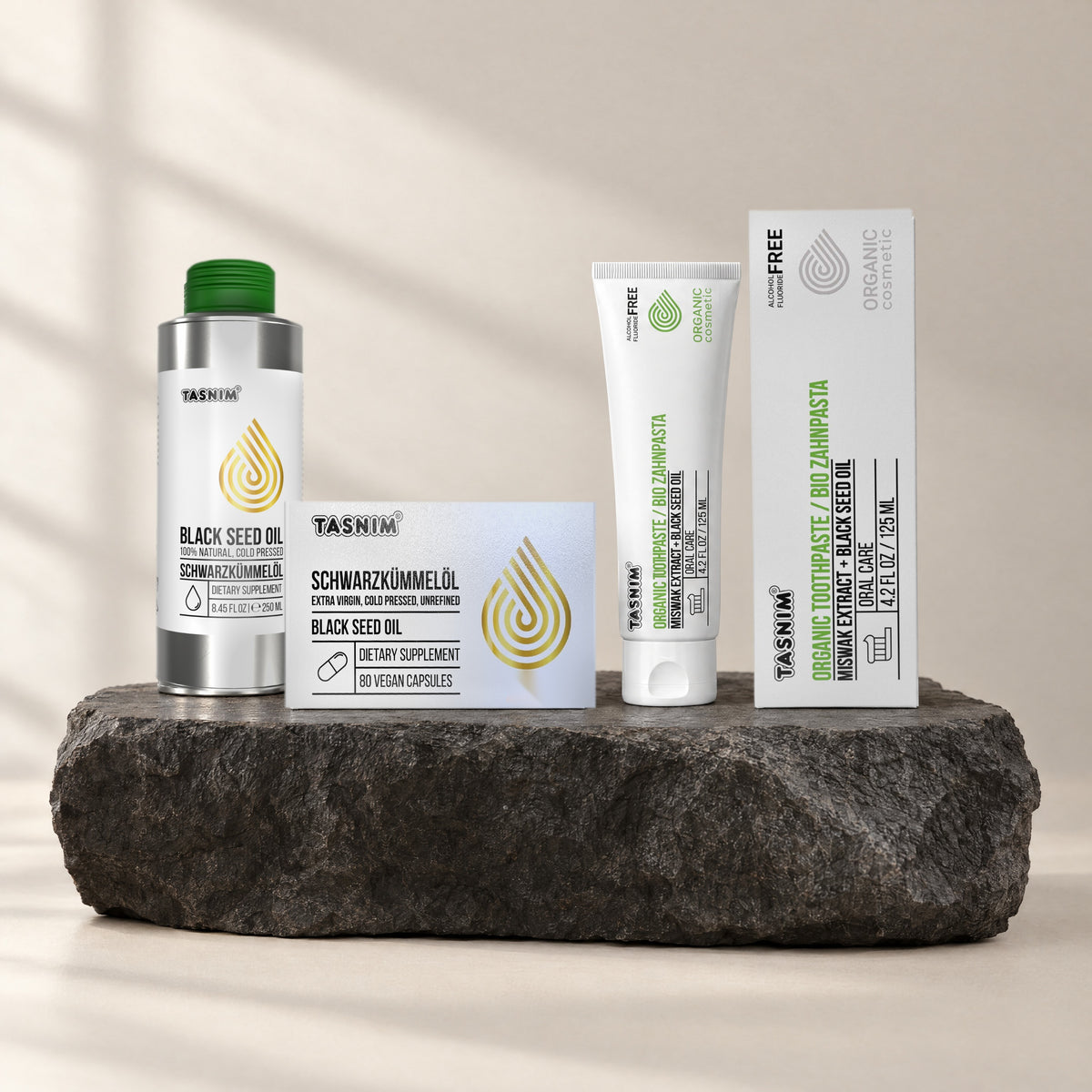 Schwarzkümmel Premium Set: äthiopisches Schwarzkümmelöl 250 ml, Schwarzkümmelöl-Kapseln und Bio-Zahnpasta 125 ml auf Basaltstein
